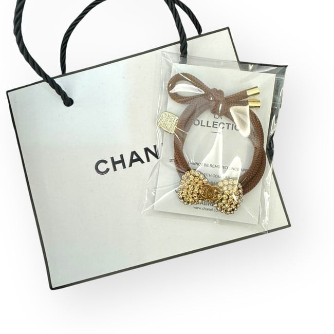 VIP/GWP Gold Rhinestone CC Bow Hair Tie