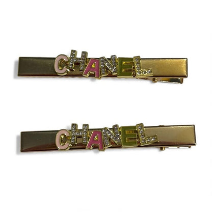 VIP/GWP Gold 2Pc Rhinestone Logo Hair Clips