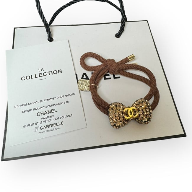 VIP/GWP Gold Rhinestone CC Bow Hair Tie