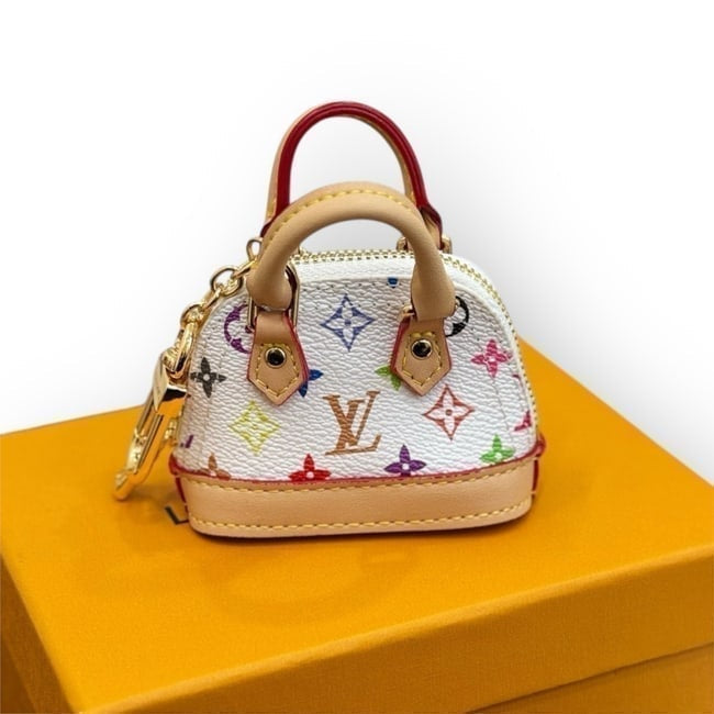 VIP/GWP White Monogram Alma Bag with Box