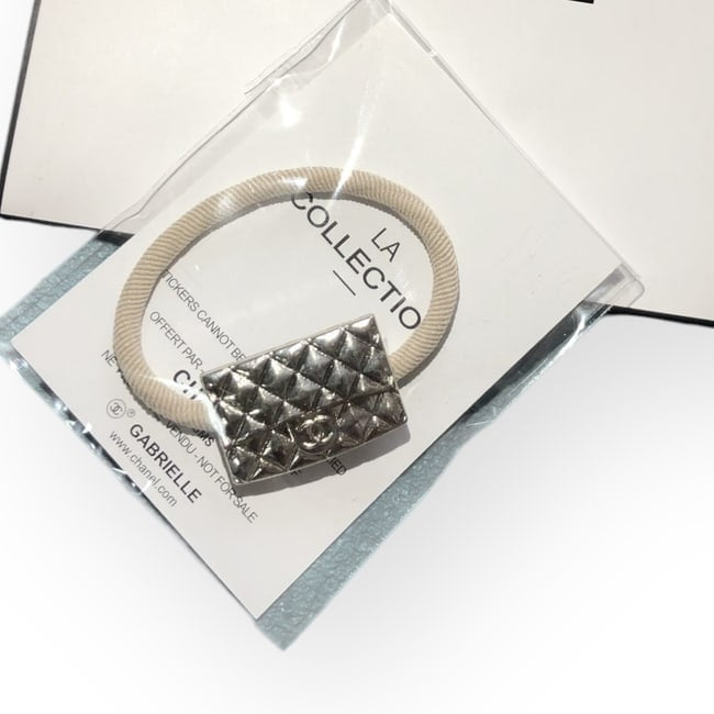 VIP/GWP Silver Hair Tie with Gift Bag